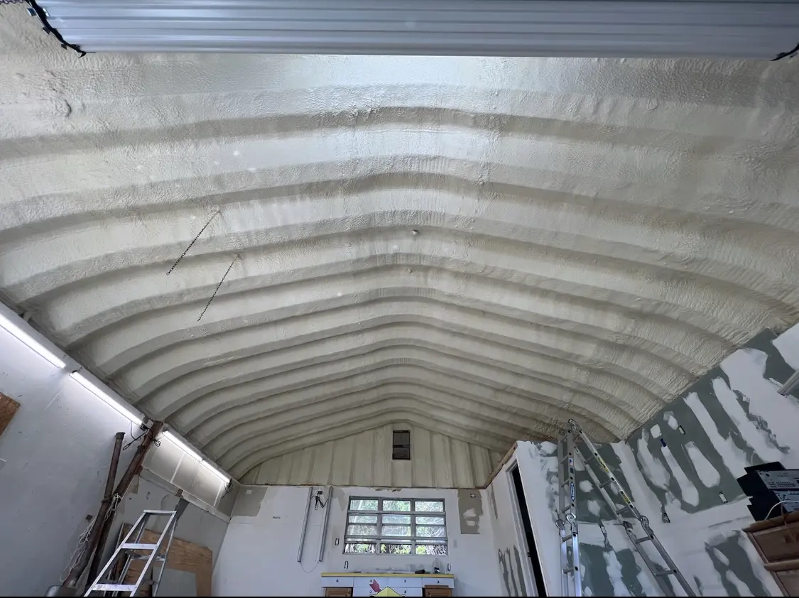 Spray polyurethane foam applied to the underside of a metal roof deck in Golden Gate